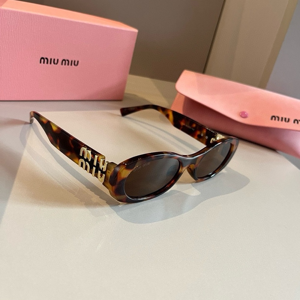 Miu Miu Tortoise Shell Sunglasses